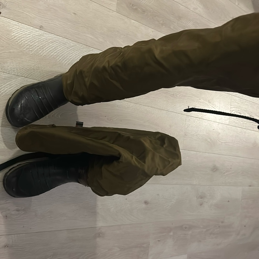 Men’s hunting boots with snake chaps. Cut on each boot at calf. Due to wide calf